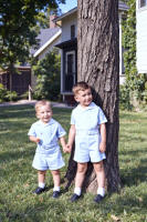 http://leighlarson.com/JPG%20Final%20Larson%20Reed%20and%20Leigh%20beside%20Tree,%20ca%201944.jpg.jpg